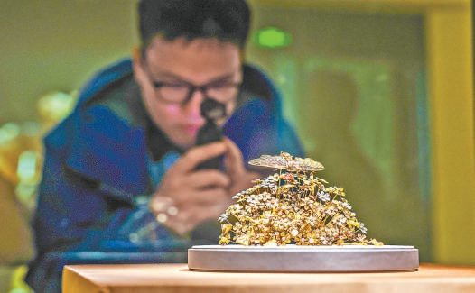 李靜訓墓出土的鬧蛾金釵。